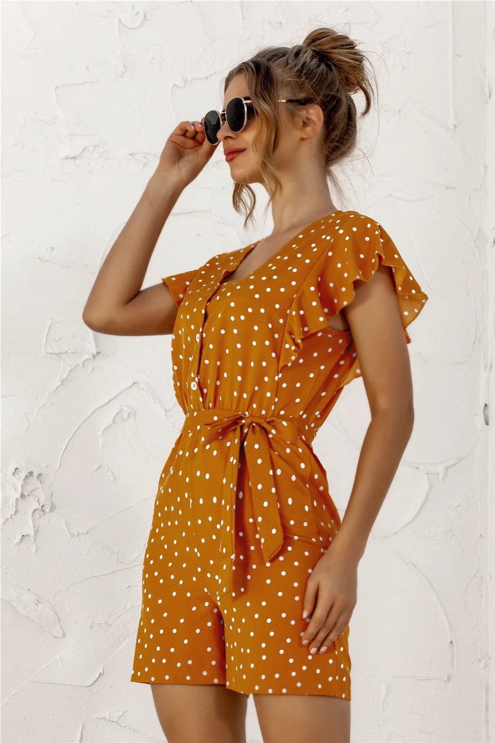 Ruffled Polka Dot Half Button Romper by Lady Ros