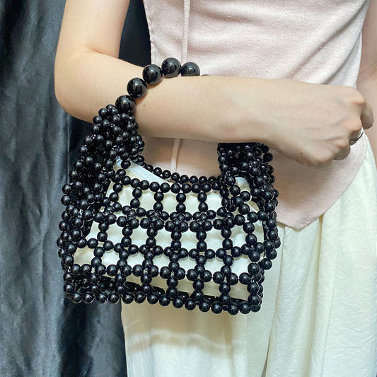 High Sense Minority Simple Elegant Hollow Out Cutout Handmade Beaded Dumpling Bag Retro Woven Handbag