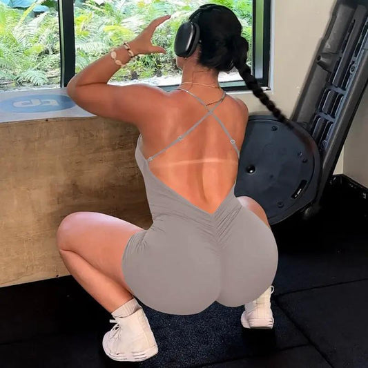 Fashionable Sexy Solid-color Strap Jumpsuit With A Backless Design by GJG Denim