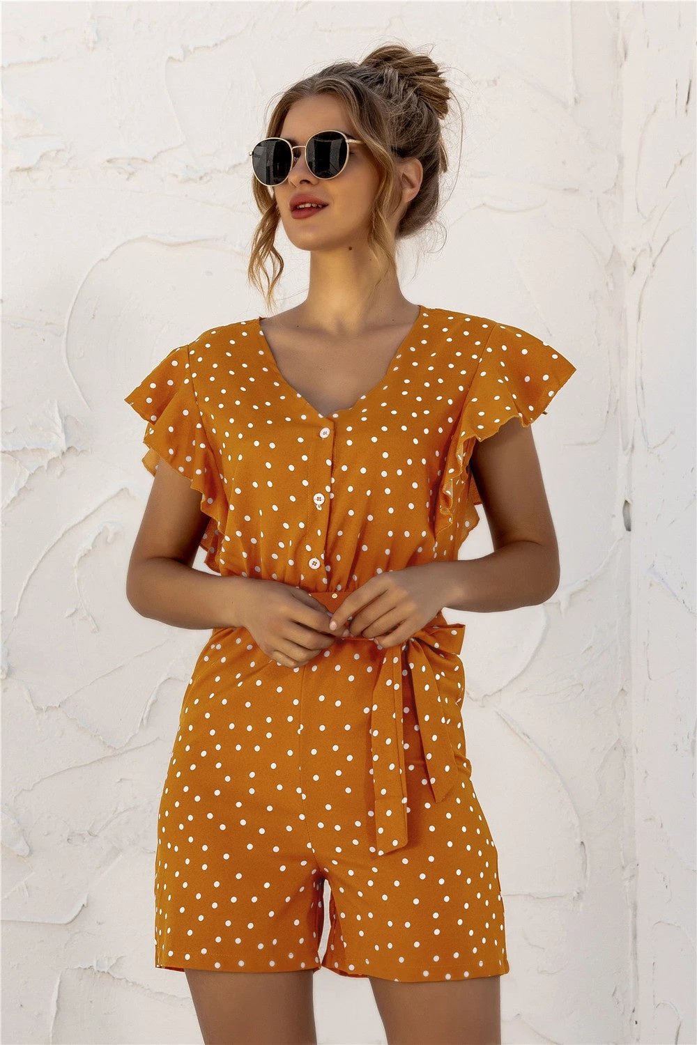 Ruffled Polka Dot Half Button Romper by Lady Ros