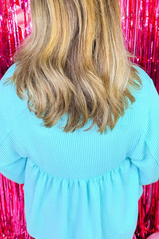 Plus Size Textured Peplum Long Sleeve Blouse by Lady Ros