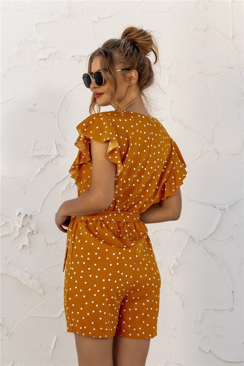 Ruffled Polka Dot Half Button Romper by Lady Ros